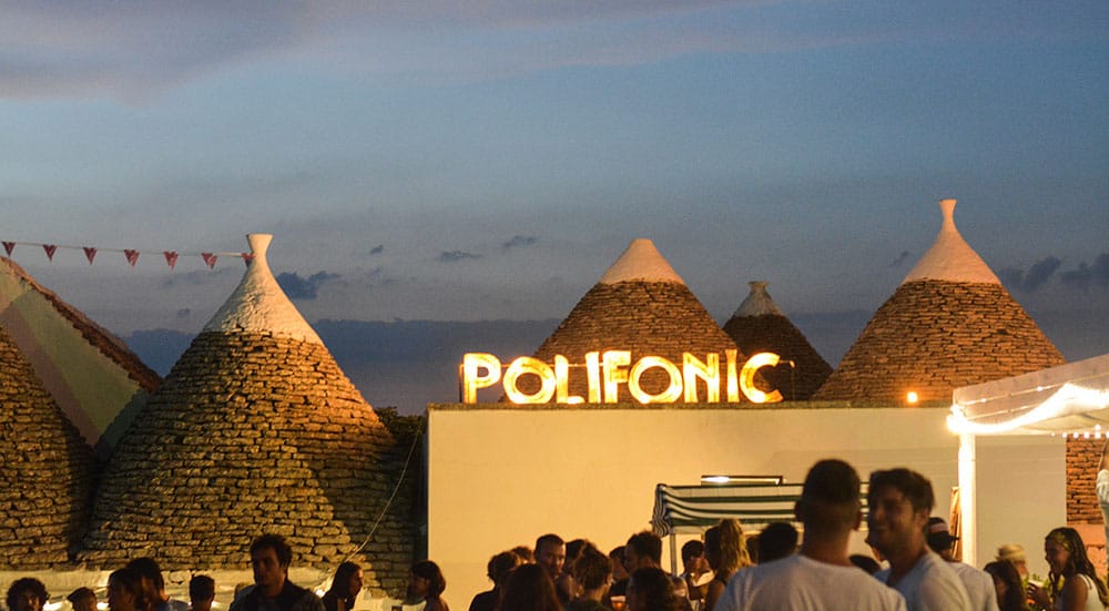 Polifonic festival sign on rooftops