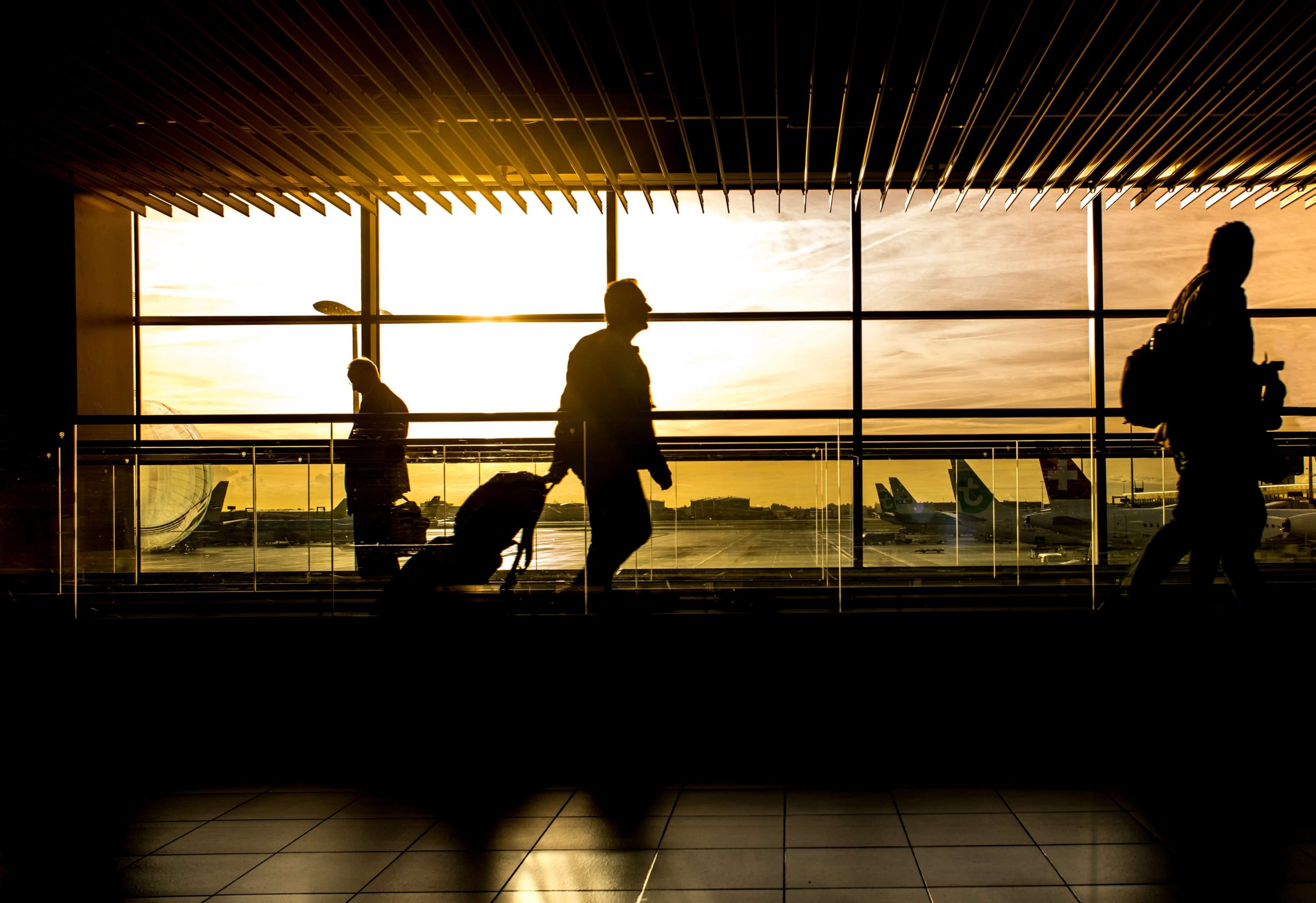 Silhouette of person in airport.