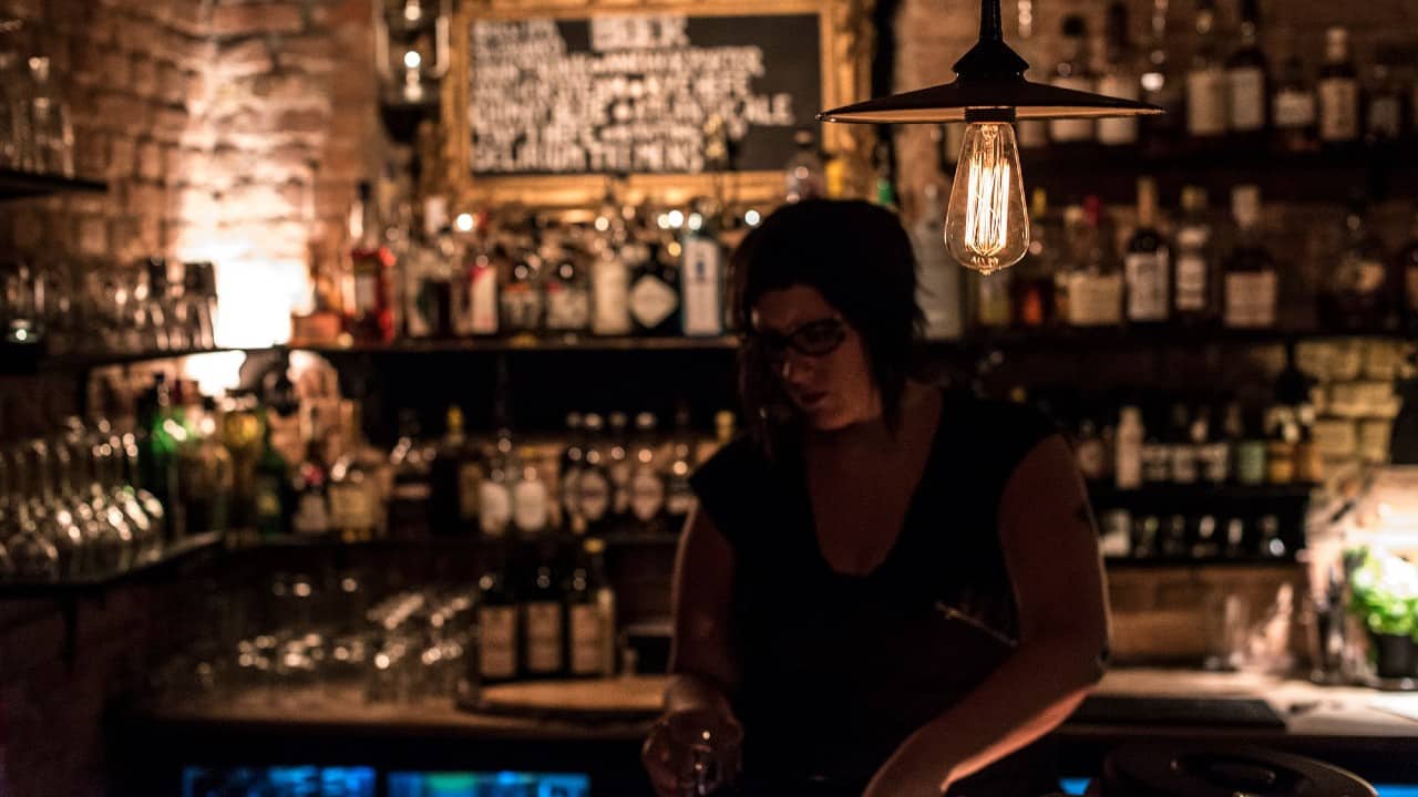 John Muir Owner Kate Coffee bartending