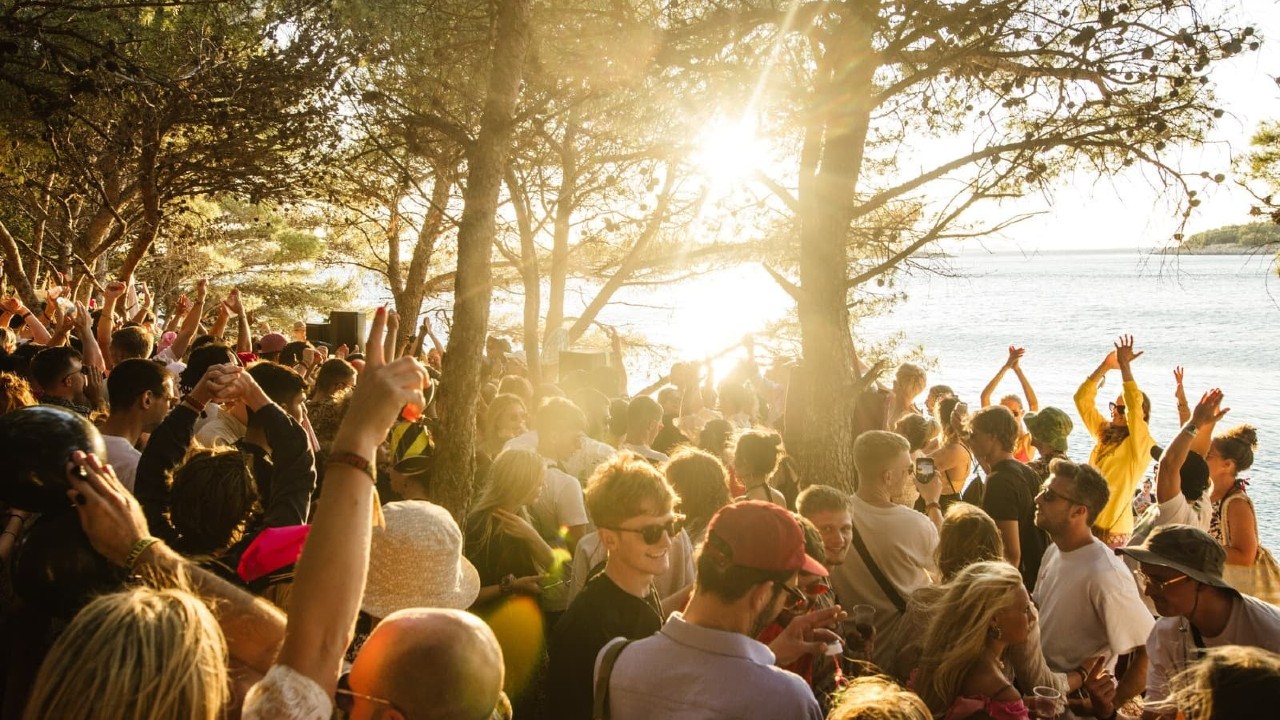 Love International Festival sun trees crowd